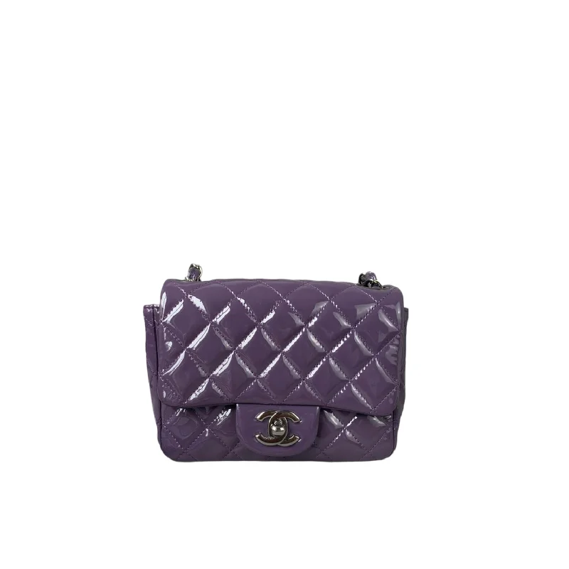 Water-resistant travel backpacksMini Square Flap Purple Patent