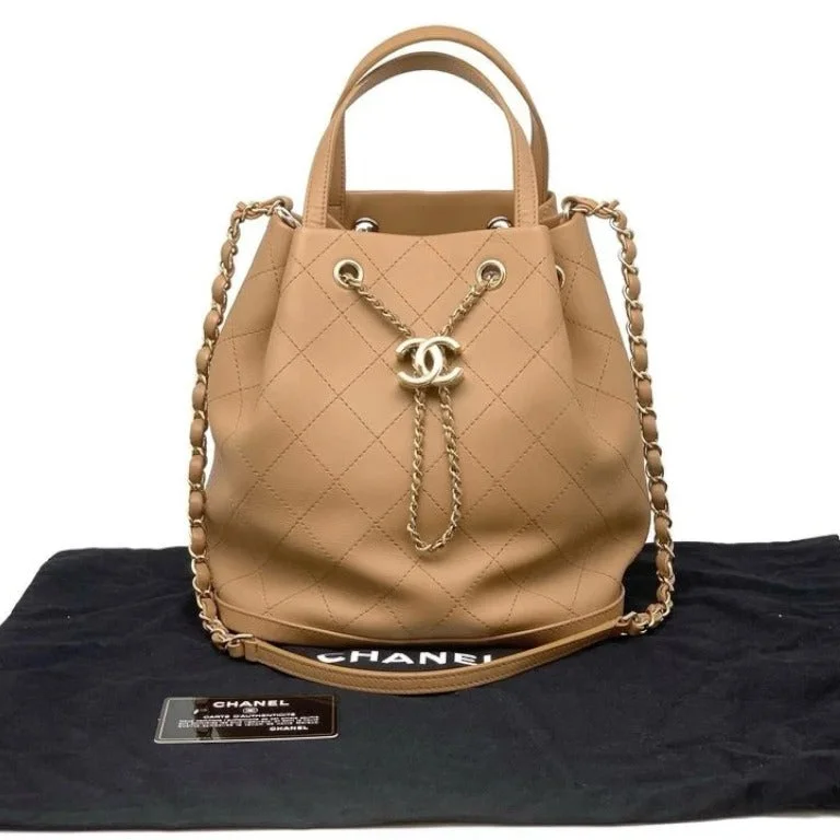 Trendy bucket bags for summerHandle Bucket Two Ways Drawstring CC Calfskin Beige GHW