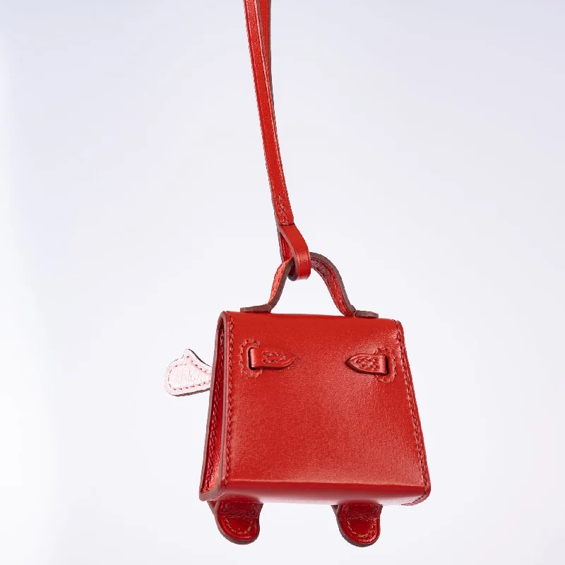 Sustainable fashion bagsHermès Micro Kelly Quelle Idole Bag Charm Rose Sakura, Sanguine, Nata, Sesame, Tadelakt and Chevre Mysore Gold Hardware